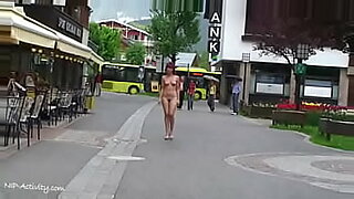 Teen shows her nude body on a public street