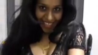 Hot Indian bhabhi teases with tattoos and big tits