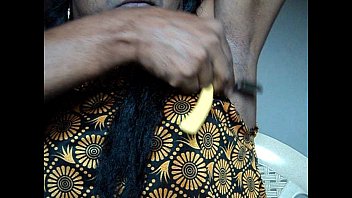 Indian gal shaving armpits hair by straight razor..AVI