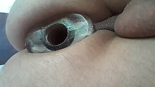 Playing with an anal tunnel plug and vibrator egg