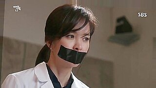 Asian babe gagged and bound in medical BDSM fetish