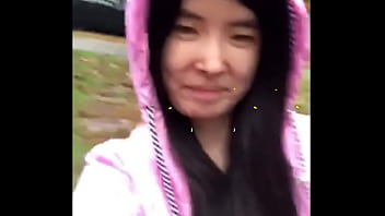 Asian Teen publicly exposes herself in the rain!