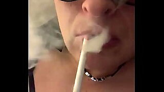 Cd Nikki sexy smoking with pink lipstick and strings up