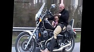 Touch boobs at motorcycle