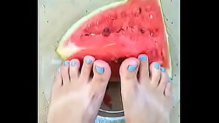cute feet smashing watermelon